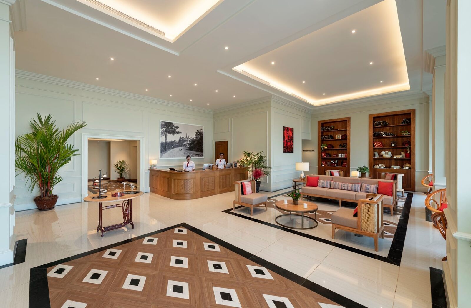 Reception desk and seating area in the hotel lobby